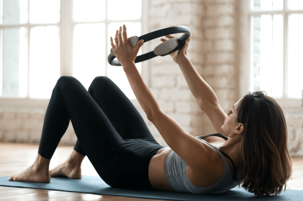 8 Benefits Of Pilates That Prove It's Much More Than A Core Workout